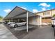 The carport provides covered parking for residents at 8830 Sw 98Th Pl # M, Ocala, FL 34481