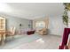 Inviting living room featuring comfortable seating, natural light, and stylish decor at 8830 Sw 98Th Pl # M, Ocala, FL 34481