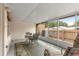 Screened patio with outdoor seating, perfect for enjoying the weather at 8830 Sw 98Th Pl # M, Ocala, FL 34481