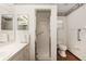 Bathroom features a walk-in shower, toilet, and a white vanity with drawers and cabinets at 8959 Sw 96Th Ln # A, Ocala, FL 34481