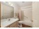 This bathroom features a shower-tub combo, a sink with vanity, and neutral decor at 8959 Sw 96Th Ln # A, Ocala, FL 34481