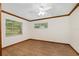 Bedroom featuring natural light, hardwood floors, and a ceiling fan at 8959 Sw 96Th Ln # A, Ocala, FL 34481