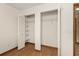 This bedroom closet features white shelving and storage in an off-white painted room at 8959 Sw 96Th Ln # A, Ocala, FL 34481