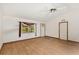 Living room featuring wood-look floors, a window, and a ceiling fan at 8959 Sw 96Th Ln # A, Ocala, FL 34481