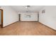 Bright, open living room features hardwood floors and neutral paint at 8959 Sw 96Th Ln # A, Ocala, FL 34481