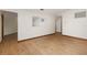 Spacious living room featuring wood-look floors and neutral paint at 8959 Sw 96Th Ln # A, Ocala, FL 34481