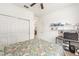 Comfortable bedroom with large closet, desk, and a bright window, offering a peaceful retreat at 9222 Sw 97Th Cir, Ocala, FL 34481