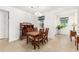 Dining room with traditional furniture, stylish window treatments, and ample natural light at 9222 Sw 97Th Cir, Ocala, FL 34481