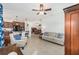 View of the open-concept living room from the kitchen and dining area, offering ample space for gatherings at 9222 Sw 97Th Cir, Ocala, FL 34481