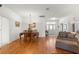 Living room with hardwood flooring and ample seating at 9746 Sw 89Th Loop, Ocala, FL 34481