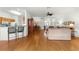 Large living space showcasing an open floor plan with hardwood flooring at 9746 Sw 89Th Loop, Ocala, FL 34481