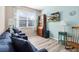 Cozy living room with comfortable seating and a view of the neighborhood at 9926 Sw 95Th Loop, Ocala, FL 34481