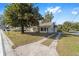 Lovely home with mature trees, a spacious front yard and a traditional driveway at 114 Ne 11Th Ave, Ocala, FL 34470
