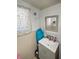 Bathroom with modern vanity, mirror, and bright lighting provides a functional space at 15536 Se 203Rd Ave, Umatilla, FL 32784
