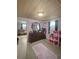 Bedroom featuring dresser and decorations creates a unique space at 15536 Se 203Rd Ave, Umatilla, FL 32784