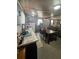 Functional kitchen area offering ample counter space, perfect for meal preparation and storage at 15536 Se 203Rd Ave, Umatilla, FL 32784