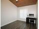 Bedroom with a dark desk and chair, and wood planked ceiling at 1829 Nw 85Th Loop, Ocala, FL 34475