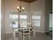 Inviting dining area with bright natural light, perfect for Gathering meals and entertaining at 1829 Nw 85Th Loop, Ocala, FL 34475