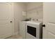 Laundry room with a side by side washer and dryer at 1829 Nw 85Th Loop, Ocala, FL 34475