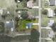 Aerial view of a home showcasing its spacious lot, complemented by a well-defined property line at 205 Ne 53Rd St, Ocala, FL 34479