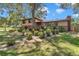 The house has a red roof, brick accents, and well-maintained landscaping at 2676 Se 52Nd Ave, Ocala, FL 34480
