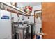 Laundry room equipped with modern washing machines and a water heater at 2676 Se 52Nd Ave, Ocala, FL 34480