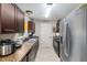Functional kitchen with stainless steel appliances and ample cabinet space at 2690 Sw 154Th Ln, Ocala, FL 34473