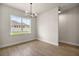 Dining area with bright window and modern chandelier at 2792 Se 29Th St, Ocala, FL 34471