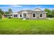 Charming single-story home with stone accents and a lush green lawn at 2792 Se 29Th St, Ocala, FL 34471