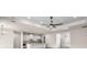 Open-concept living space with stylish lighting and island kitchen at 2792 Se 29Th St, Ocala, FL 34471
