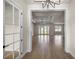 Bright, open-concept living space with wood floors and recessed lighting at 2792 Se 29Th St, Ocala, FL 34471