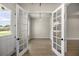 Office with French doors and neutral walls for a tranquil workspace at 2792 Se 29Th St, Ocala, FL 34471