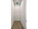 Neutral walk-in closet with tile floors and wire shelving ready to organize your wardrobe at 2792 Se 29Th St, Ocala, FL 34471