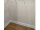 Spacious closet with wood-look tile flooring, ample storage, and room for all your needs at 2792 Se 29Th St, Ocala, FL 34471