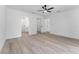 A spacious bedroom leads to an ensuite bathroom and a walk-in closet, offering ample storage and privacy at 28 Water Track Dr, Ocala, FL 34472