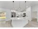 Bright kitchen with quartz counters, modern appliances, and an open layout at 28 Water Track Dr, Ocala, FL 34472