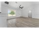 Spacious living room features a front door and a vaulted ceiling at 28 Water Track Dr, Ocala, FL 34472