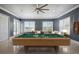 Entertainment room offers a full-sized billiard table with a comfortable lounge area at 3440 Sw 66Th St, Ocala, FL 34476