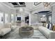 Bright living room with custom ceiling, stylish furniture, and an open floor plan at 3440 Sw 66Th St, Ocala, FL 34476