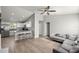 Spacious living area featuring hardwood floors, modern decor, and natural light at 3645 Sw 151St Ct, Ocala, FL 34481