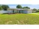 Single-story home with a well-manicured lawn and tidy landscaping at 4325 Se 60Th St, Ocala, FL 34480