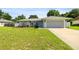 Charming single-story home with well-maintained lawn and a two-car garage at 4325 Se 60Th St, Ocala, FL 34480