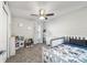 bedroom equipped with toys, carpeted floors, and a ceiling fan at 4955 Se 89Th Place Rd, Ocala, FL 34480