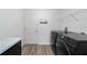 Laundry room with modern washer and dryer, plus extra countertop space at 4955 Se 89Th Place Rd, Ocala, FL 34480