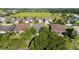 A sprawling residential community near a lush golf course with neatly arranged homes and well-maintained landscaping are shown at 4970 Nw 35Th Lane Rd, Ocala, FL 34482