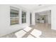 Bright bonus room features many windows, and light wood-look floors at 4970 Nw 35Th Lane Rd, Ocala, FL 34482