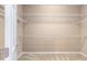 Walk-in closet with shelving and carpeting at 4970 Nw 35Th Lane Rd, Ocala, FL 34482