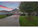Charming single-story home with a brick-paved driveway and well-maintained lawn at 4970 Nw 35Th Lane Rd, Ocala, FL 34482