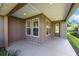 Covered patio area with ample space for outdoor seating and entertaining at 4970 Nw 35Th Lane Rd, Ocala, FL 34482