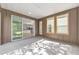 Screened in porch with sliding glass doors leading to the kitchen and outdoor access at 4970 Nw 35Th Lane Rd, Ocala, FL 34482